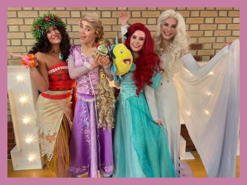 Four Dress Up and Dream Princesses smiling for the camera